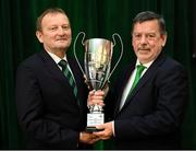 18 August 2018; David Martin, President of the Irish Football Association, left, and FAI President Donal Conway pose with the The President's Junior Cup during the Football Association of Ireland Annual General Meeting at the Rochestown Park Hotel in Cork. Photo by Stephen McCarthy/Sportsfile