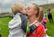 18 August 2018; Neamh Woods of Tyrone kissing her nephew Senan Maguire, age 3, in celebration after the 2018 TG4 All-Ireland Ladies Intermediate Football Championship semi-final match between Sligo and Tyrone at Fr. Tierney Park in Donegal. Photo by Oliver McVeigh/Sportsfile