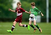 18 August 2018; James Hagan of Clonguish, Co. Longford, in action against Trent Slattery of Clarinbridge, Co. Galway, competing in the Soccer Outdoor U12 Final event during day one of the Aldi Community Games August Festival at the University of Limerick in Limerick. Photo by Harry Murphy/Sportsfile