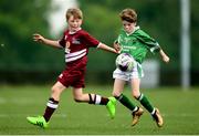 18 August 2018; James Hagan of Clonguish, Co. Longford, in action against Trent Slattery of Clarinbridge, Co. Galway, competing in the Soccer Outdoor U12 Final event during day one of the Aldi Community Games August Festival at the University of Limerick in Limerick. Photo by Harry Murphy/Sportsfile