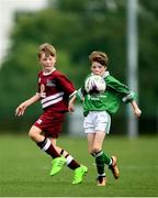 18 August 2018; James Hagan of Clonguish, Co. Longford, in action against Trent Slattery of Clarinbridge, Co. Galway, competing in the Soccer Outdoor U12 Final event during day one of the Aldi Community Games August Festival at the University of Limerick in Limerick. Photo by Harry Murphy/Sportsfile