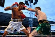 18 August 2018; Cristofer Rosales, left, in action against Paddy Barnes during their WBO World Flyweight Title bout at Windsor Park in Belfast. Photo by Ramsey Cardy/Sportsfile