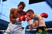 18 August 2018; Cristofer Rosales, left, in action against Paddy Barnes during their WBO World Flyweight Title bout at Windsor Park in Belfast. Photo by Ramsey Cardy/Sportsfile
