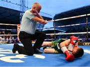 18 August 2018; Paddy Barnes is counted out by the Referee during his WBO World Flyweight Title bout against Cristofer Rosales at Windsor Park in Belfast. Photo by Ramsey Cardy/Sportsfile