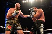 18 August 2018; Tyson Fury, left, in action against Francesco Pianeta during their heavyweight bout at Windsor Park in Belfast. Photo by Ramsey Cardy/Sportsfile