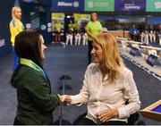 18 August 2018; Nicole Turner of Ireland is presented with her silver medal by Eimear Breathnach after finishing in second place in the final of the Women's 50m Butterfly S6 event during day six of the World Para Swimming Allianz European Championships at the Sport Ireland National Aquatic Centre in Blanchardstown, Dublin. Photo by David Fitzgerald/Sportsfile