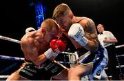 18 August 2018; Carl Frampton, right, in action against Luke Jackson during their interim World Boxing Organisation World Featherweight Title bout at Windsor Park in Belfast. Photo by Ramsey Cardy/Sportsfile