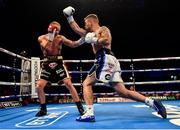 18 August 2018; Carl Frampton, right, in action against Luke Jackson during their interim World Boxing Organisation World Featherweight Title bout at Windsor Park in Belfast. Photo by Ramsey Cardy/Sportsfile