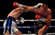 18 August 2018; Carl Frampton, left, in action against Luke Jackson during their interim World Boxing Organisation World Featherweight Title bout at Windsor Park in Belfast. Photo by Ramsey Cardy/Sportsfile