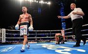 18 August 2018; Carl Frampton, left, after knocking down Luke Jackson in the 8th round of their interim World Boxing Organisation World Featherweight Title bout at Windsor Park in Belfast. Photo by Ramsey Cardy/Sportsfile
