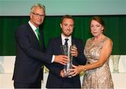 17 August 2018; Karl Lambe of St Kevin's Boys is presented with the Noel O'Reilly Coach of the Year award by Ruud Dokter, FAI High Performace Director, and Rose McAllorum at the FAI Delegates Dinner & FAI Communications Awards at the Rochestown Park Hotel in Cork. Photo by Stephen McCarthy/Sportsfile