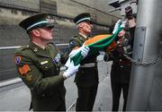 19 August 2018; Members of the Irish Defence Forces, from left, Sergeant Ian Jones, Sergeant Brian Harte and Captain Dermot Considine raise the Irish tricolour ahead of the GAA Hurling All-Ireland Senior Championship Final between Galway and Limerick at Croke Park in Dublin. Photo by Stephen McCarthy/Sportsfile