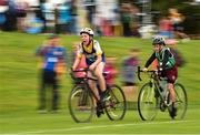 19 August 2018; Jake Feery of Fethard Killusty, Co. Tipperary, left, competing in the Cycling on Grass U12 & O10 Boys event during day two of the Aldi Community Games August Festival at the University of Limerick in Limerick. Photo by Sam Barnes/Sportsfile