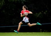 19 August 2018; Maeve Lavelle of Milltown, Co. Kildare, competing in the Rugby Tag U14 event during day two of the Aldi Community Games August Festival at the University of Limerick in Limerick. Photo by Harry Murphy/Sportsfile
