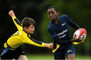 19 August 2018; Daniel Alex of Monaghan Town, Co. Monaghan, in action against John Paul Flanagan of Rosses Point, Co. Sligo, competing in the Rugby Tag U11 event during day two of the Aldi Community Games August Festival at the University of Limerick in Limerick. Photo by Harry Murphy/Sportsfile