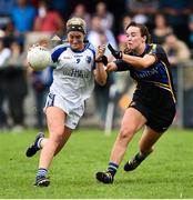 19 August 2018; Donna English of Cavan in action against Brid Condon of Tipperary during the 2018 TG4 All-Ireland Ladies Senior Football Championship relegation play-off match between Cavan and Galway at Dolan Park in Cavan. Photo by Oliver McVeigh/Sportsfile