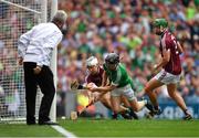 19 August 2018; Graeme Mulcahy of Limerick scores his side's first goal despite the efforts of Daithí Burke of Galway during the GAA Hurling All-Ireland Senior Championship Final match between Galway and Limerick at Croke Park in Dublin. Photo by Eóin Noonan/Sportsfile