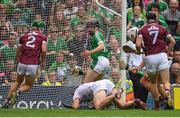 19 August 2018; Graeme Mulcahy of Limerick, centre, on his way to scoring his side's first goal, despite the efforts of Galway players, from left, Adrian Tuohy, James Skehill, and Aidan Harte during the GAA Hurling All-Ireland Senior Championship Final match between Galway and Limerick at Croke Park in Dublin.  Photo by Piaras Ó Mídheach/Sportsfile