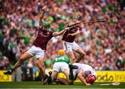 19 August 2018; Galway players, from left, Adrian Tuohy, Pádraic Mannion and James Skehill in action against Séamus Flanagan of Limerick during the GAA Hurling All-Ireland Senior Championship Final match between Galway and Limerick at Croke Park in Dublin. Photo by Stephen McCarthy/Sportsfile