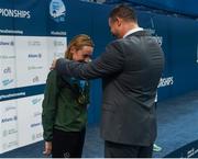 19 August 2018; Ellen Keane of Ireland being presented with her gold medal, won in the Women's 200m Medley SM9 event, by her coach, High Performance Director Paralympics Ireland Dave Malone, during day seven of the World Para Swimming Allianz European Championships at the Sport Ireland National Aquatic Centre in Blanchardstown, Dublin. Photo by David Fitzgerald/Sportsfile