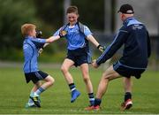 19 August 2018; Oranmore, Co. Galway, players, Ryan Holland, left, and Barry Keating, centre, celebrate Barry's father, and coach, Padraig Keating after winning the U10 and O7 Gaelic Football Mixed event during day two of the Aldi Community Games August Festival at the University of Limerick in Limerick. Photo by Sam Barnes/Sportsfile