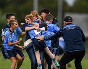 19 August 2018; Players from Oranmore, Co. Galway, celebrate with friends and family after winning the U10 and O7 Gaelic Football Mixed event during day two of the Aldi Community Games August Festival at the University of Limerick in Limerick. Photo by Sam Barnes/Sportsfile