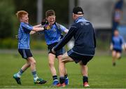 19 August 2018; Oranmore, Co. Galway, players, Ryan Holland, left, and Barry Keating, centre, celebrate Barry's father, and coach, Padraig Keating after winning the U10 and O7 Gaelic Football Mixed event during day two of the Aldi Community Games August Festival at the University of Limerick in Limerick. Photo by Sam Barnes/Sportsfile