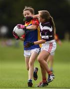 19 August 2018; Lauren Morrison of St Patrick's, Co Cavan,  in action against Eleanor Keating of Skibbereen, Co. Cork, during the U12 & O9 Girls Gaelic Football event during day two of the Aldi Community Games August Festival at the University of Limerick in Limerick. Photo by Sam Barnes/Sportsfile