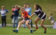 19 August 2018; Cait O'Reilly of St Patrick's, Co Cavan,  in action against Millie Coakley of Skibbereen, Co. Cork, during the U12 & O9 Girls Gaelic Football event during day two of the Aldi Community Games August Festival at the University of Limerick in Limerick. Photo by Sam Barnes/Sportsfile