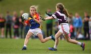 19 August 2018; Cait O'Reilly of St Patrick's, Co Cavan,  in action against Emma Hegarty of Skibbereen, Co. Cork, during the U12 & O9 Girls Gaelic Football event during day two of the Aldi Community Games August Festival at the University of Limerick in Limerick. Photo by Sam Barnes/Sportsfile