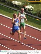 27 August 2003; Paul Brizzel, Ireland, (660) and Anastasios Gousis, Greece (599), competing in the second heat of the Men's 200m during the fifth day's competition. Brizzel finished with a season best of 20.75 to qualify for the Quarter Finals at the 9th IAAF World Championships in Athletics, Stade de France, Paris, France. Picture credit; Brendan Moran / SPORTSFILE
