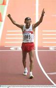 27 August 2003; Robert Korzeniowski, Poland, celebrates winning Gold and setting a new World Record of 3.36.03 in the Men's 50K Walk Final during the fifth day's competition at the 9th IAAF World Championships in Athletics at the Stade de France, Paris, France. Picture credit; Brendan Moran / SPORTSFILE