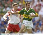 24 August 2003; John Sheehan of Kerry in action against Enda McGinley of Tyrone during the Bank of Ireland All-Ireland Senior Football Championship Semi-Final match between Tyrone and Kerry at Croke Park in Dublin. Photo by Damien Eagers/Sportsfile