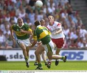 24 August 2003; Cormac McAnallen of Tyrone, in action against Sean O'Sullivan and Darragh O'Se of Kerry during the Bank of Ireland All-Ireland Senior Football Championship Semi-Final match between Tyrone and Kerry at Croke Park in Dublin. Photo by Damien Eagers/Sportsfile
