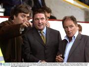 28 August 2003; Chief Executive FAI, Fran Rooney, centre, with Republic of Ireland manager Brian Kerr, right, and FAI Tresurer, John Delaney, watch on from the stand before the start of the UEFA Cup qualifying round second leg between Shelbourne and Olimpija Ljubijana at Tolka Park, Dublin. Picture credit; David Maher / SPORTSFILE