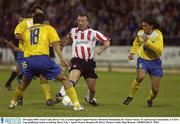 28 August 2003; Liam Coyle of Derry City in action against Apoel Nicosia's Demetris Daskalakis during the UEFA Cup qualifying round second leg between Derry City and Apoel Nicosia at the Brandywell, Derry. Photo by Matt Browne/Sportsfile