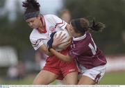 30 August 2003; Lisa McGirr of Tyrone is tackled by Galway's Lorna Joyce during the TG4 Ladies All-Ireland Senior Football Championship Quarter-Final between Galway and Tyrone at Pearse Park, Co. Longford. Picture credit; Damien Eagers / SPORTSFILE