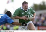 30 August 2003; John Kelly, Ireland, goes past the tackle of Italy's Gert Peens to score his try during the Permanent TSB test between Ireland and Italy at Thomond Park, Limerick. Photo by Matt Browne/Sportsfile