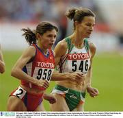 30 August 2003; Sonia O'Sullivan, Ireland (546), competing alongside Yelena Zadorozhnaya, Russia (958), in the Women's 5000m Final during the eight day's competition at the 9th IAAF World Championships in Athletics at the Stade de France, Paris, France. Picture credit; Brendan Moran / SPORTSFILE
