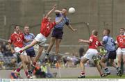 31 August 2003; John Coghlan, Dublin, in action against Cork's Patrick Kelly in the All-Ireland Minor Football Championship Semi-Final between Dublin and Cork at Croke Park, Dublin. Picture credit; Damien Eagers / SPORTSFILE