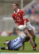 31 August 2003; Cork's Fiontan Gould, in action against Dublin's Aidan Downes in the All-Ireland Minor Football Championship Semi-Final between Dublin and Cork at Croke Park, Dublin. Picture credit; Damien Eagers / SPORTSFILE