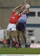 31 August 2003; Brendan Phelan, Dublin, in action against Cork's Eoin Cadogan in the All-Ireland Minor Football Championship Semi-Final between Dublin and Cork at Croke Park, Dublin. Picture credit; Damien Eagers / SPORTSFILE
