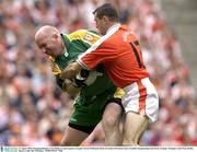 31 August 2003; Donegal goalkeeper, Tony Blake, in action against Armagh's Steven McDonnell during the Bank of Ireland All-Ireland Senior Football Championship Semi-Final between Armagh and Donegal at Croke Park in Dublin. Photo by Ray McManus/Sportsfile