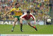 31 August 2003; Michael Hegarty of Donegal in action against Andy Mallon of Armagh during the Bank of Ireland All-Ireland Senior Football Championship Semi-Final between Armagh and Donegal at Croke Park in Dublin. Photo by Ray McManus/Sportsfile