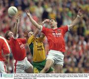 31 August 2003; Paul McGrane, right, and Francie Bellew of Armagh, in action against Adrian Swenney of Donegal during the Bank of Ireland All-Ireland Senior Football Championship Semi-Final between Armagh and Donegal at Croke Park in Dublin. Photo By Ray McManus/Sportsfile