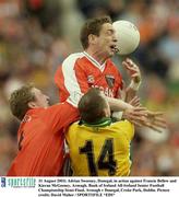 31 August 2003; Adrian Sweeney, Donegal, in action against Francie Bellew and Kieran McGeeney, Armagh during the Bank of Ireland All-Ireland Senior Football Championship Semi-Final between Armagh and Donegal at Croke Park in Dublin. Photo by Ray McManus/Sportsfile