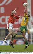 31 August 2003; Paul McGrane, Armagh, in action against Donegal's John Gildea during the Bank of Ireland All-Ireland Senior Football Championship Semi-Final between Armagh and Donegal at Croke Park in Dublin. Photo by Ray McManus/Sportsfile
