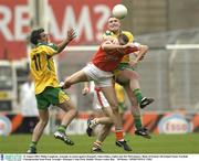 31 August 2003; Philip Loughran, Armagh, in action against Donegal's John Gildea, (right) and Jim McGuinness during the Bank of Ireland All-Ireland Senior Football Championship Semi-Final between Armagh and Donegal at Croke Park in Dublin. Photo by Ray McManus/Sportsfile