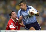 31 August 2003; Aidan Relihan, Dublin, in action against Kevin Hartnell, Cork in the All-Ireland Minor Football Championship Semi-Final between Dublin and Cork at Croke Park, Dublin. Picture credit; Damien Eagers / SPORTSFILE