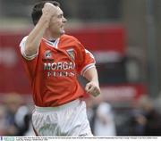 29 August 2003; Oisin McConville, Armagh, celebrates the last minute penalty during the Bank of Ireland All-Ireland Senior Football Championship Semi-Final between Armagh and Donegal at Croke Park in Dublin. Photo by Ray McManus/Sportsfile